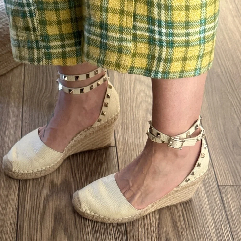 These are Valentino Garavani Rockstud textured-leather espadrille wedge heel